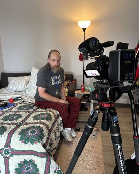 An interview being filmed in a living room
